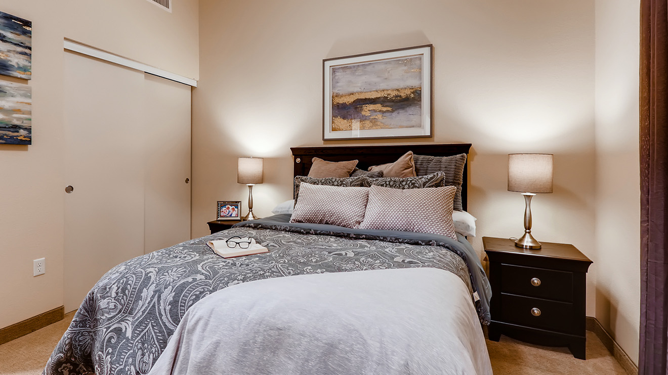 Holiday Westgate Village modern apartment bedroom with queen sized bed and two bedside tables